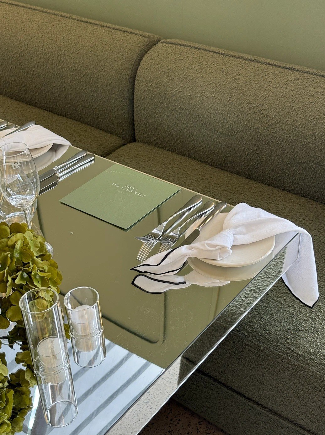 Olive menu on mirrored table