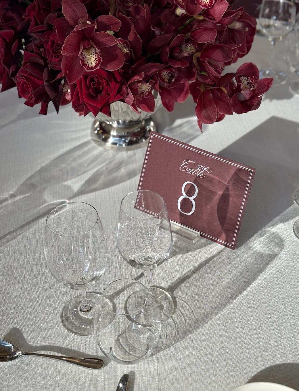 Burgundy florals beside table number